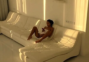 Black Asian Teen jumping on red cock in white room