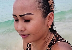 Nasty Thai MILF masturbating and sucking