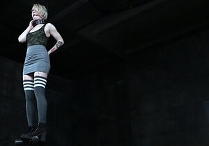 BDSM dom facializing a stranded blonde teen