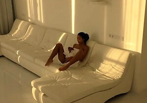 Black Asian Teen jumping on red cock in white room